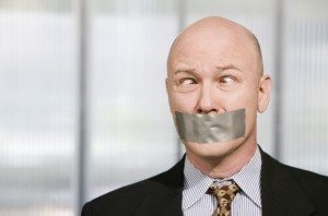 Cross-eyed businessman silenced with duct tape over his mouth